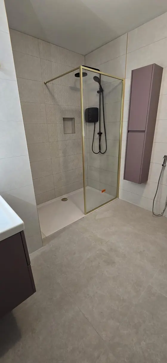 Newly renovated bathroom with walk-in shower, glass screen and black fittings in Bandon, Co. Cork